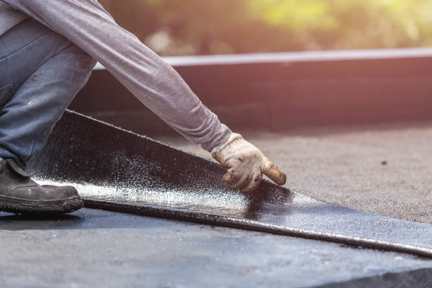 Professional Basement Waterproofing technician working in Westwood, MI